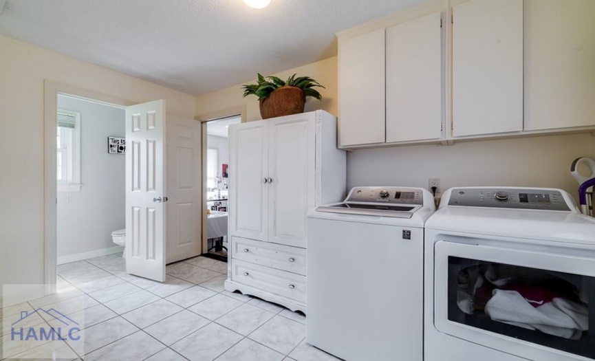 Laundry leads to powder room and FLEX room